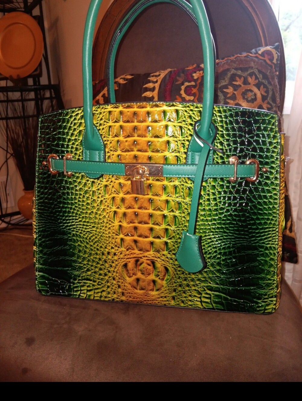 emerald green crocodile-embossed handbag